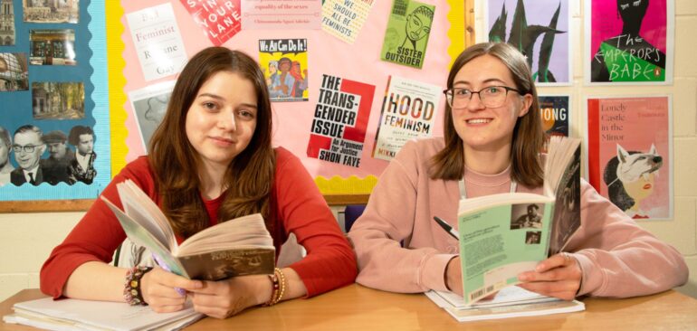 A Level English Literature students studying literature books in classroom