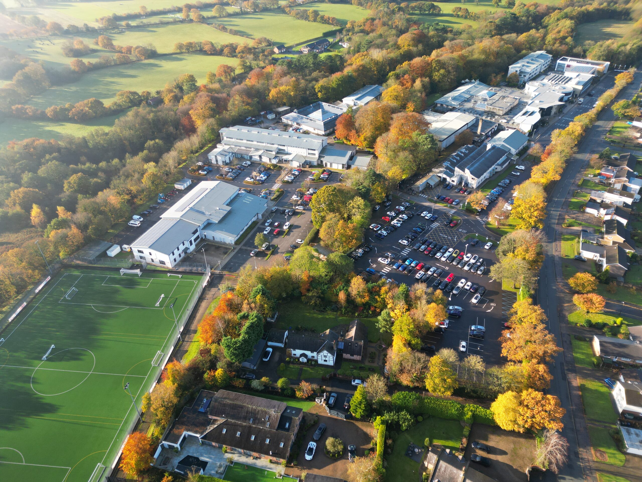 Summer aerial view of Runshaw College campus and the surrounding area.