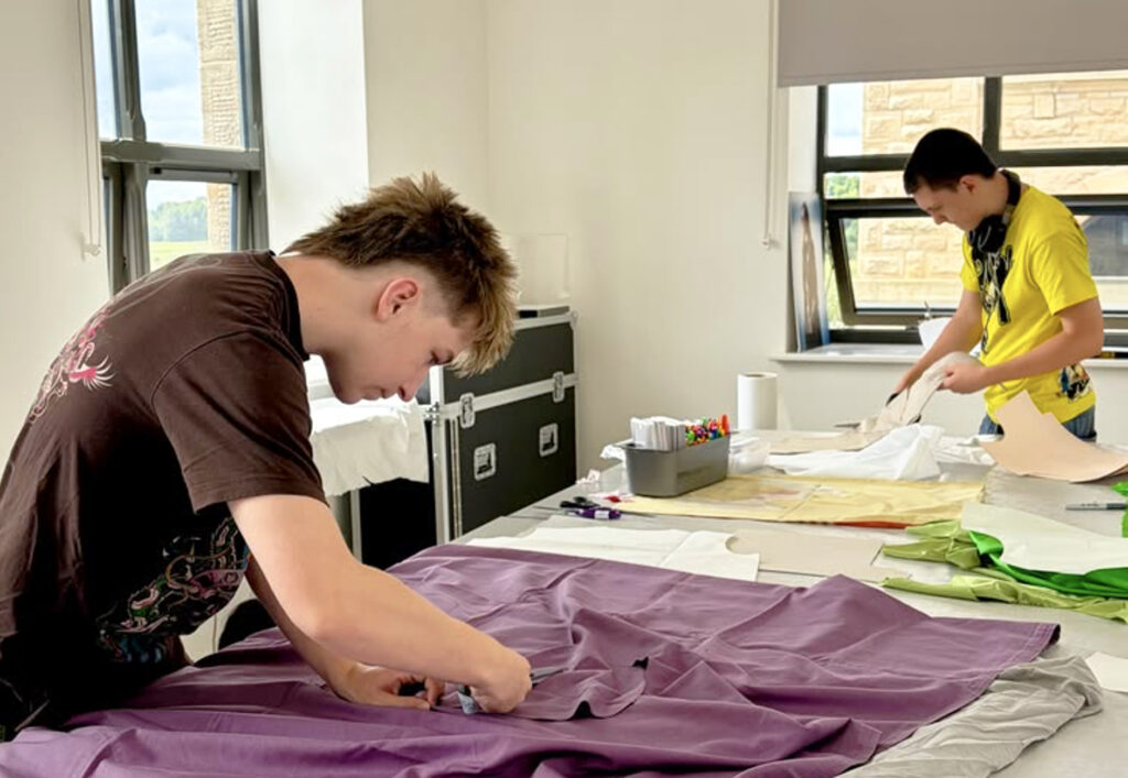CR-7693 A Level Textiles Summer Project with students sewing