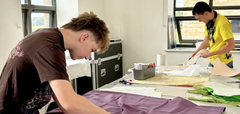 CR-7693 A Level Textiles Summer Project with students sewing
